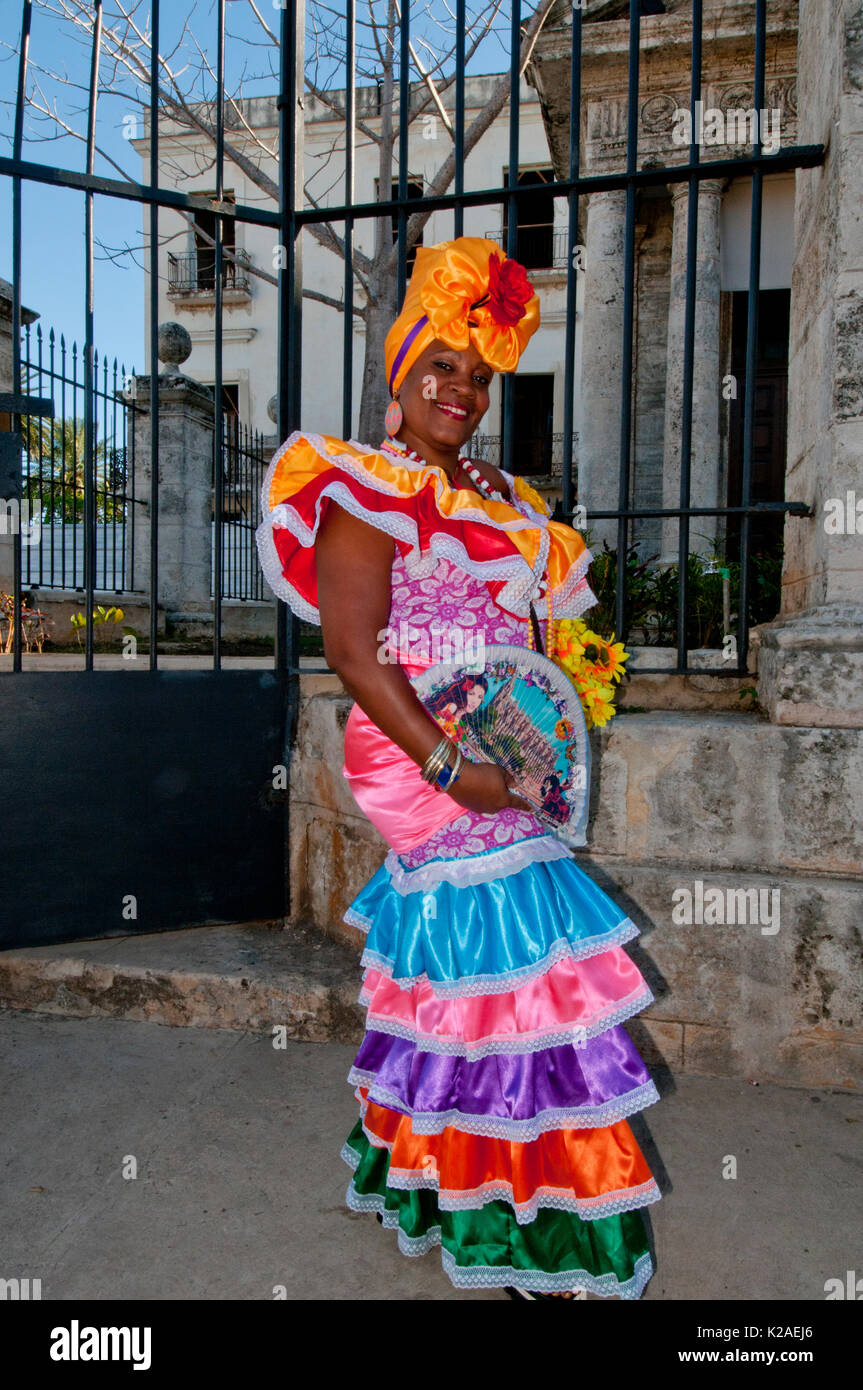 Cuban woman in traditional dress on the streets of Havana Cuba Stock Photo