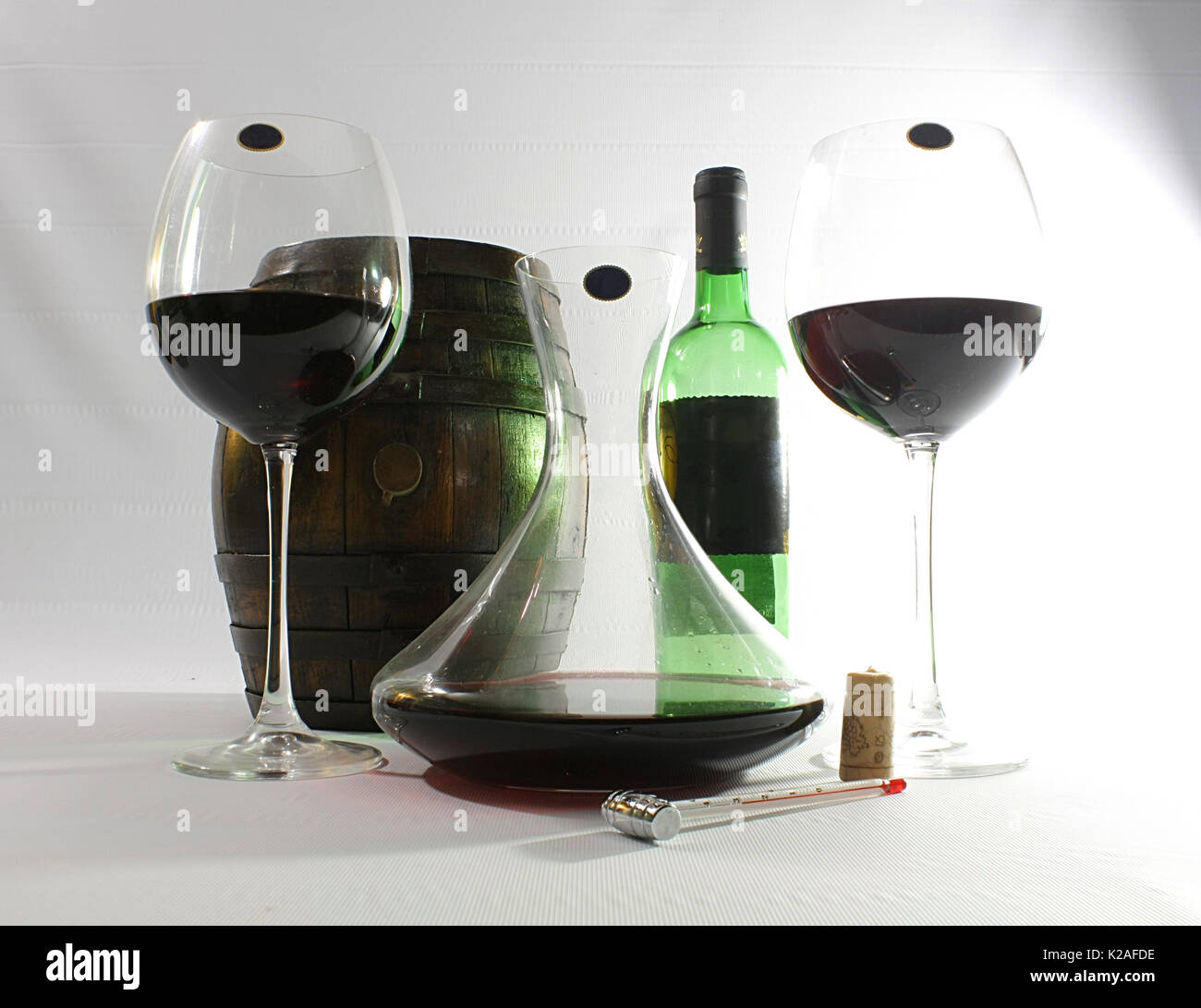Glasses, decanter, bottle and thermometer Stock Photo