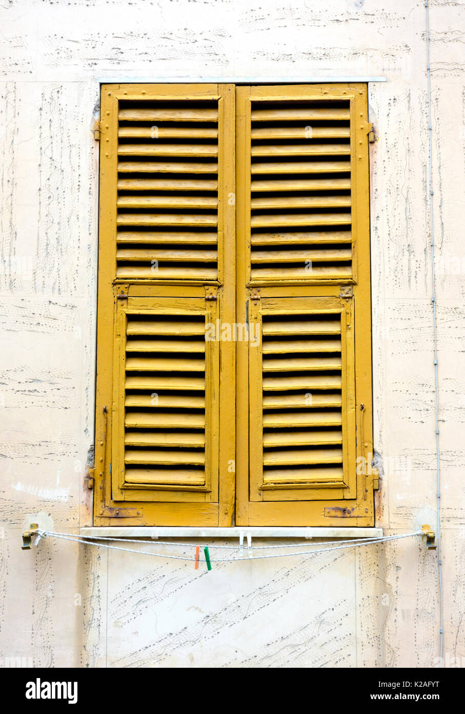 Classic closed Italian window shutters, Monterosso al Mare, 2017. Stock Photo