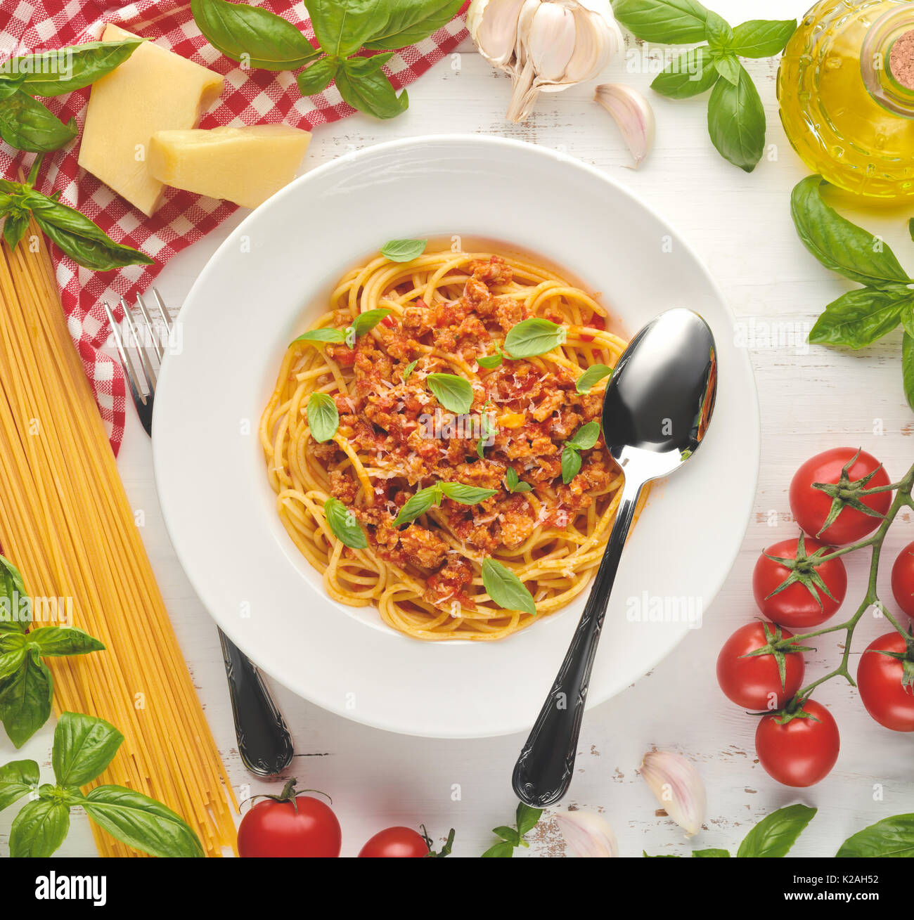 Homemade pasta with pasta ingredients on wooden table top view. Stock Photo
