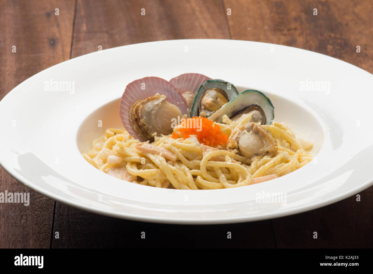 Pasta with seafood , scallop and mussel Stock Photo