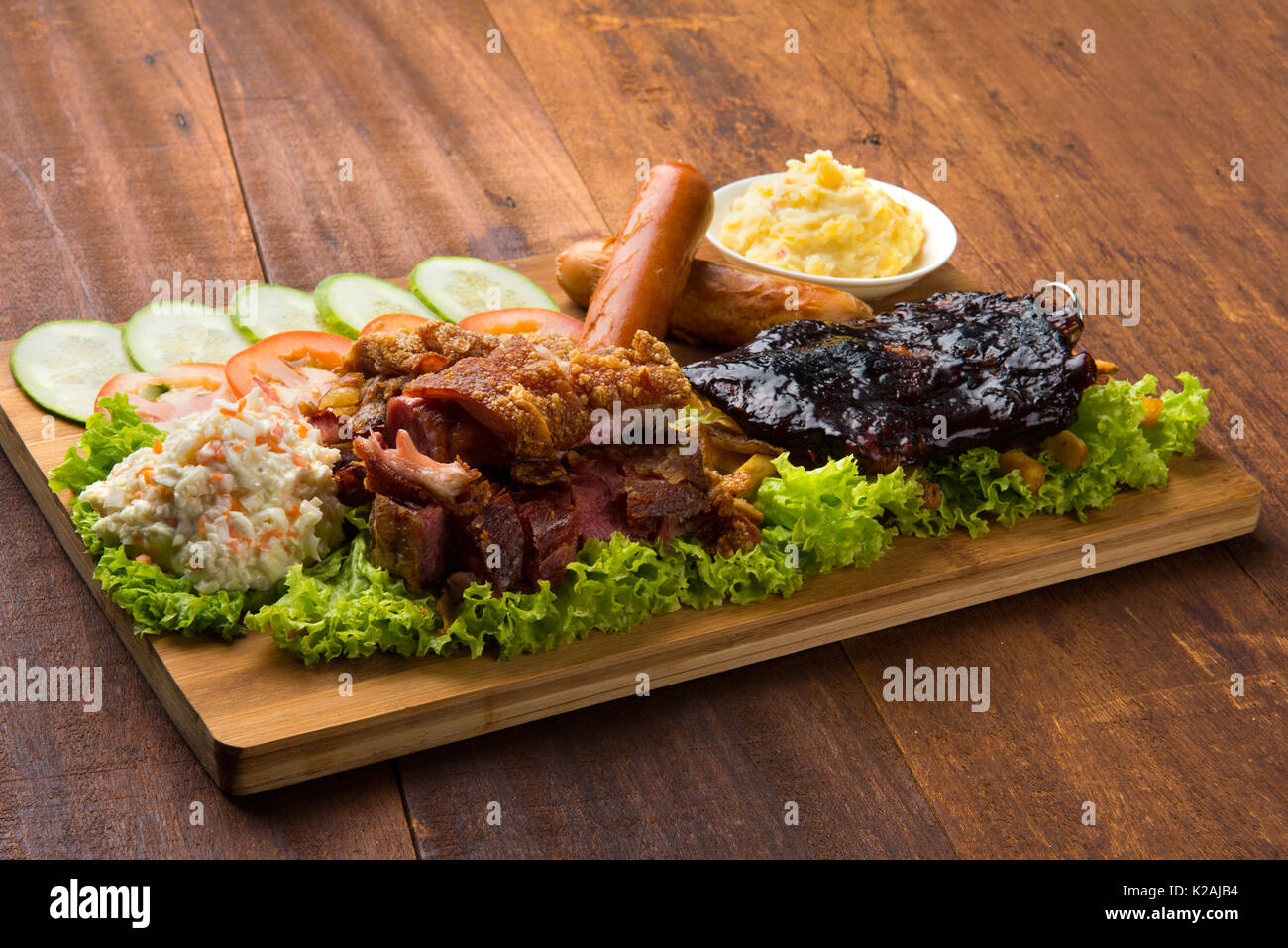 Knuckle Ribs roasted pork knuckle ribs ,sausage and mash potatoes Stock Photo - Alamy