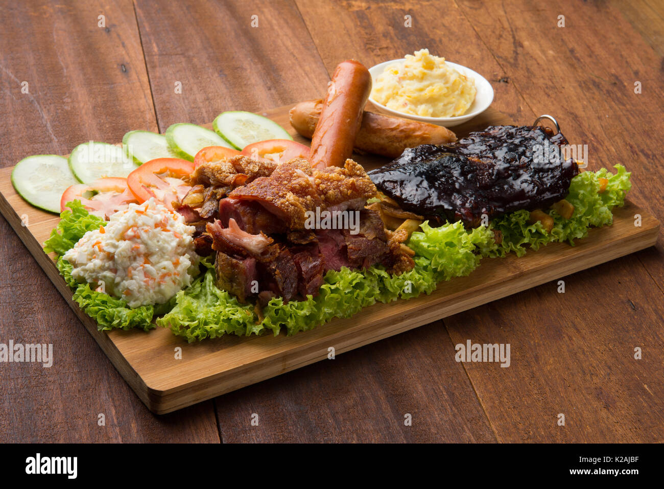 Knuckle Ribs roasted pork knuckle ribs ,sausage and mash potatoes Stock Photo - Alamy