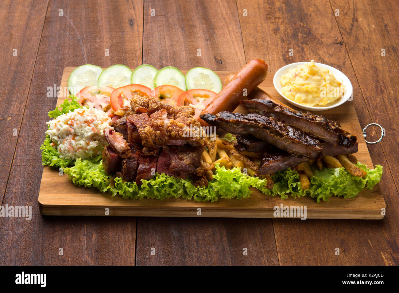 Knuckle Ribs roasted pork knuckle ribs ,sausage and mash potatoes Stock Photo - Alamy