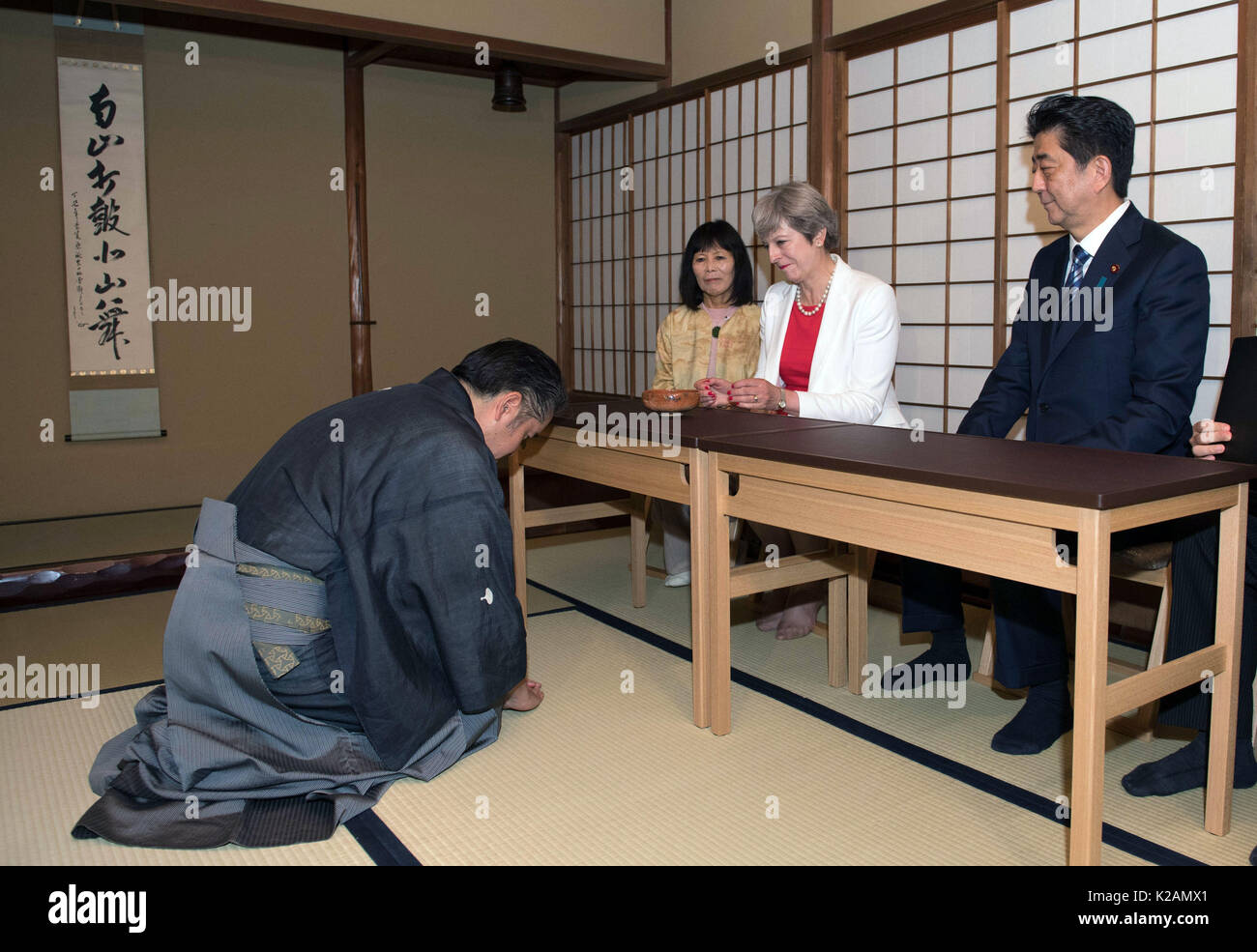 Prime Minister Theresa May takes part in a tea ceremony in Kyoto with Prime Minister of Japan Shinzo Abe (right), during her visit to the country. Stock Photo