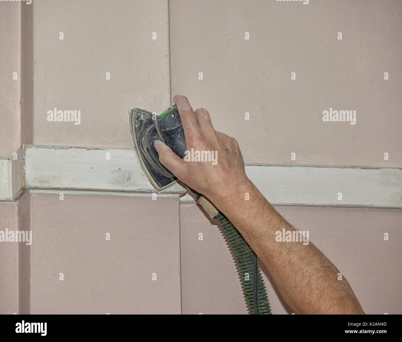 Hand with sanding machine Stock Photo Alamy