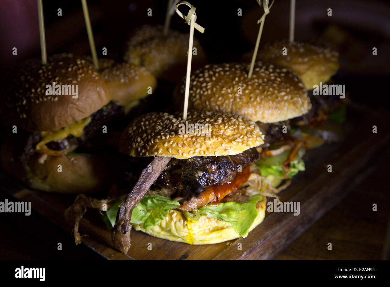 Gourmet burgers served on a wooden board in Sunderland, England. The city hosts the third Sunderland Restaurant Week from 9 to 17 September 2017. Stock Photo