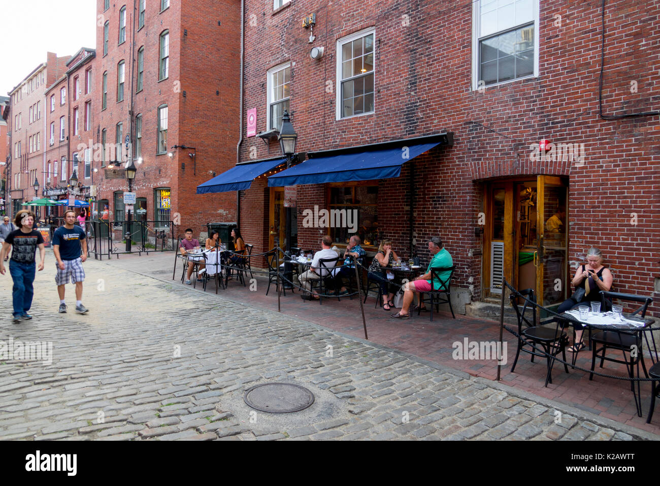 USA Maine ME Portland Old Port Wharf Street People dining outside at Street and Company restaurant Stock Photo