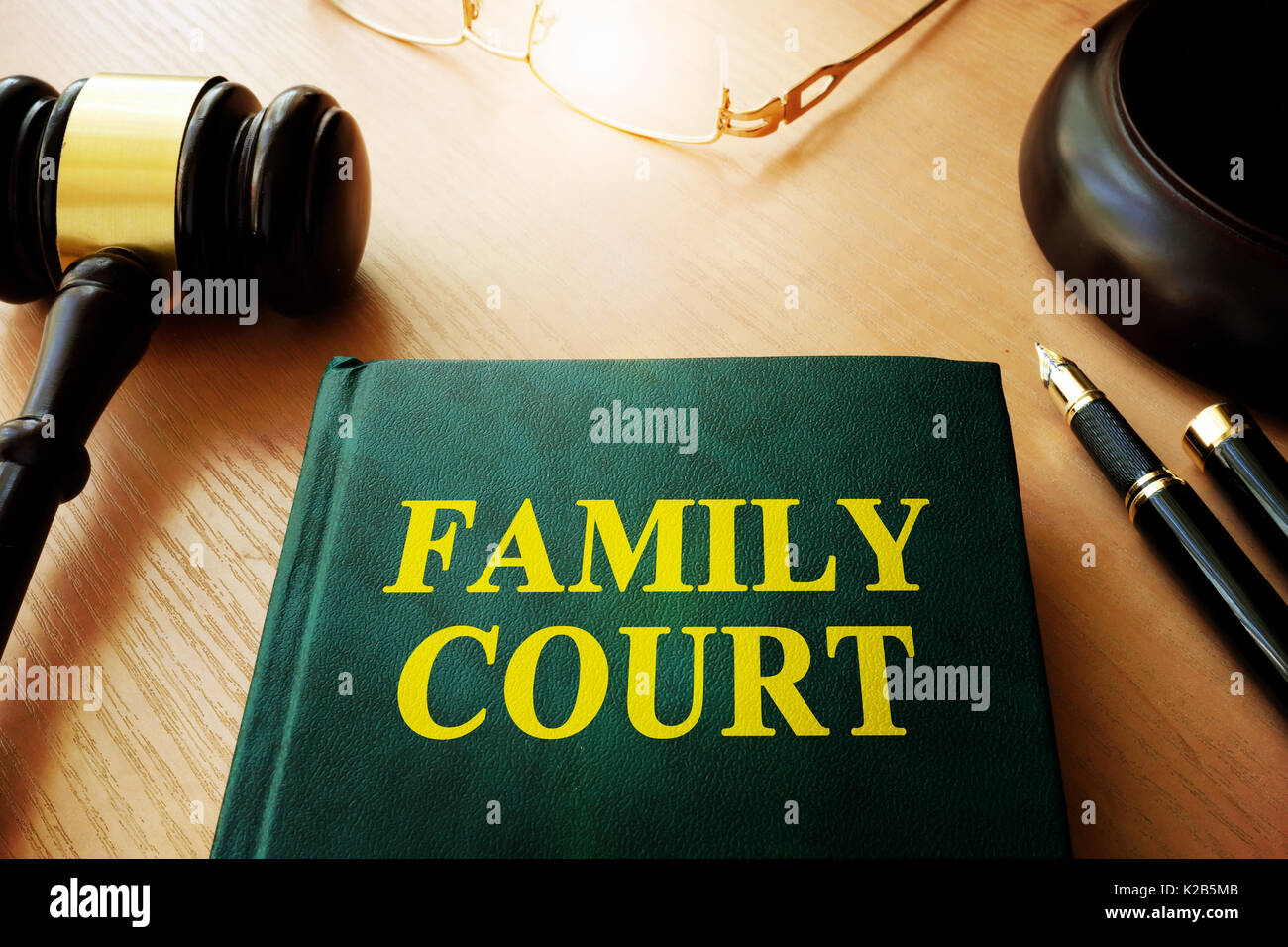 Book with title family court and gavel. Stock Photo