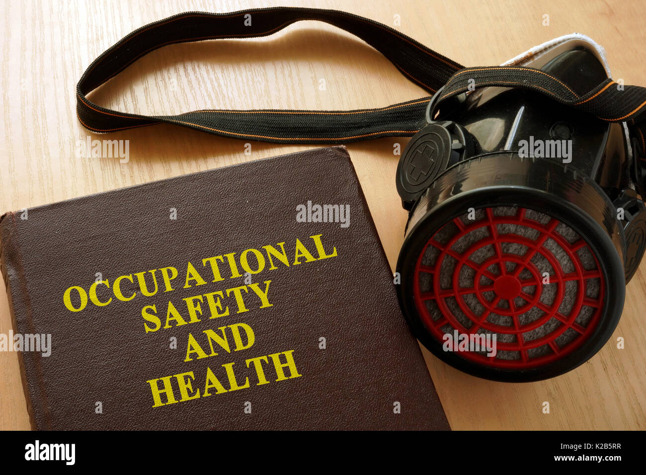 Book with title Occupational safety and health (OSH). Stock Photo