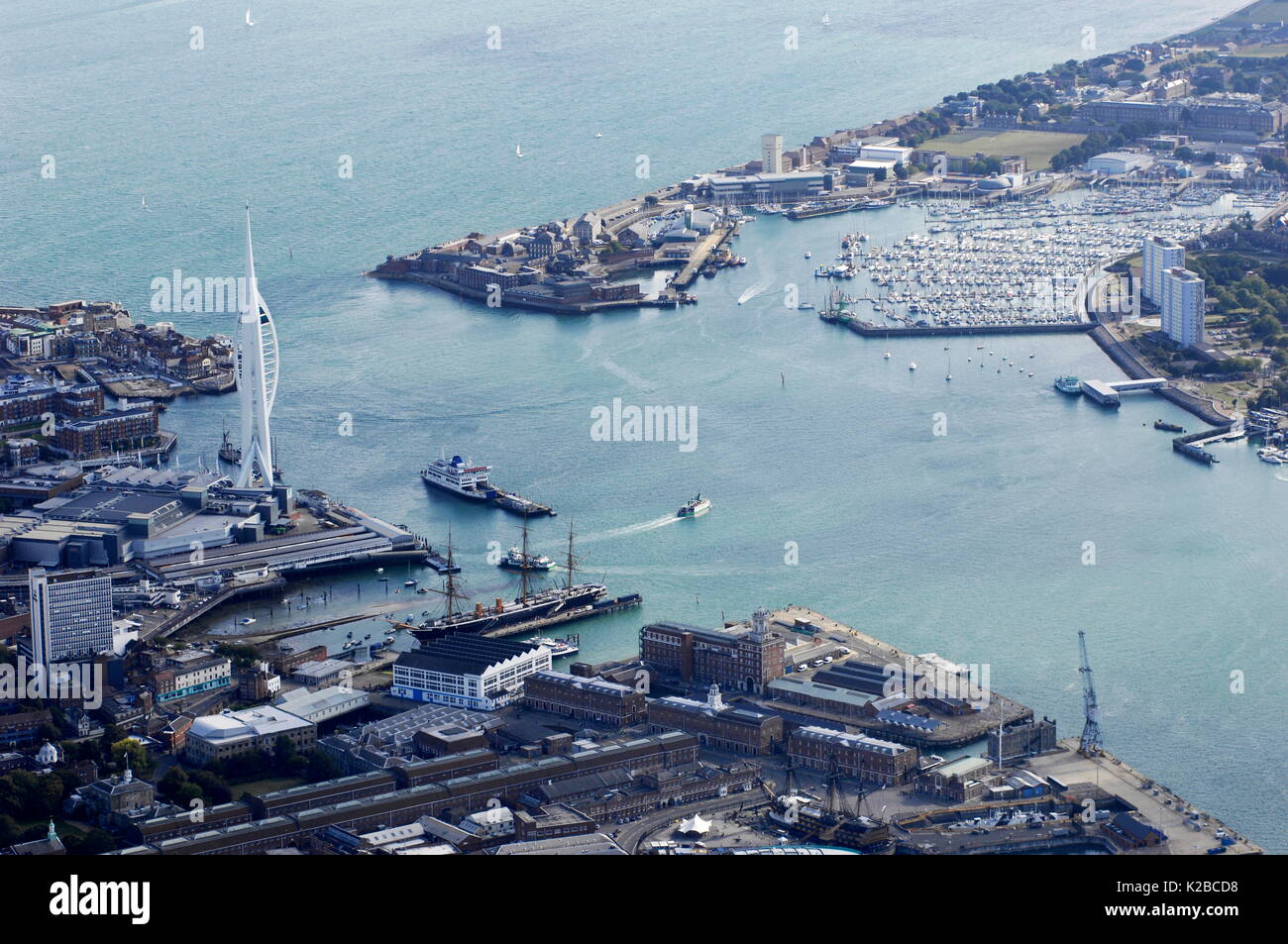 AJAXNETPHOTO. PORTSMOUTH, ENGLAND. - GENERAL AERIAL VIEW OF HARBOUR, ENTRANCE, MILLENIUM TOWER (LEFT, WHITE), HMS WARRIOR (LOWER CENTRE)  AND GOSPORT'S HASLAR MARINA TOP RIGHT. PHOTO:JONATHAN EASTLAND/AJAX REF:D110209 1558 Stock Photo