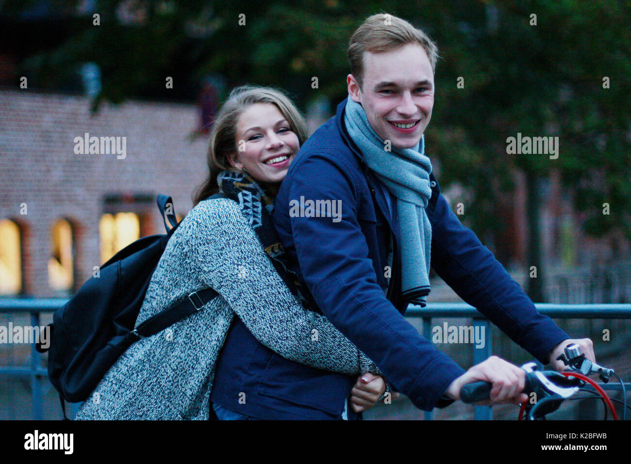 Youthful couple on a bicycle Stock Photo