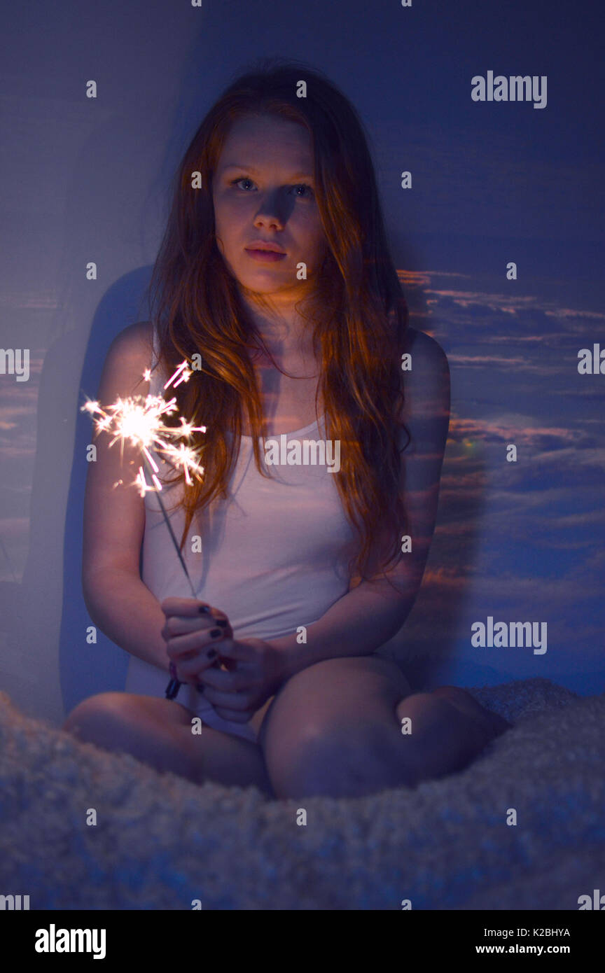 Girl with a sparkler Stock Photo