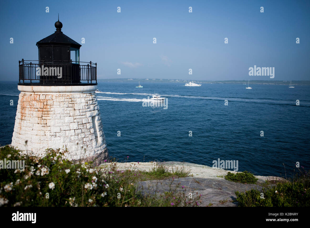 Castle Hill Lighthouse andMinor Offshore 31 leaves Newport Rhode Island, USA, August 2009. Stock Photo