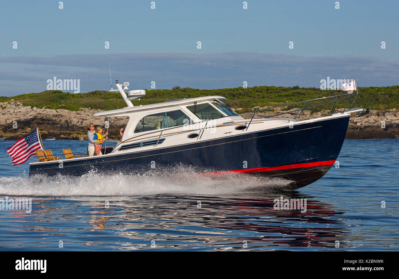 Motorboat Back Cove Downeast 37 running near Portland, Maine, USA, July 2013. Stock Photo