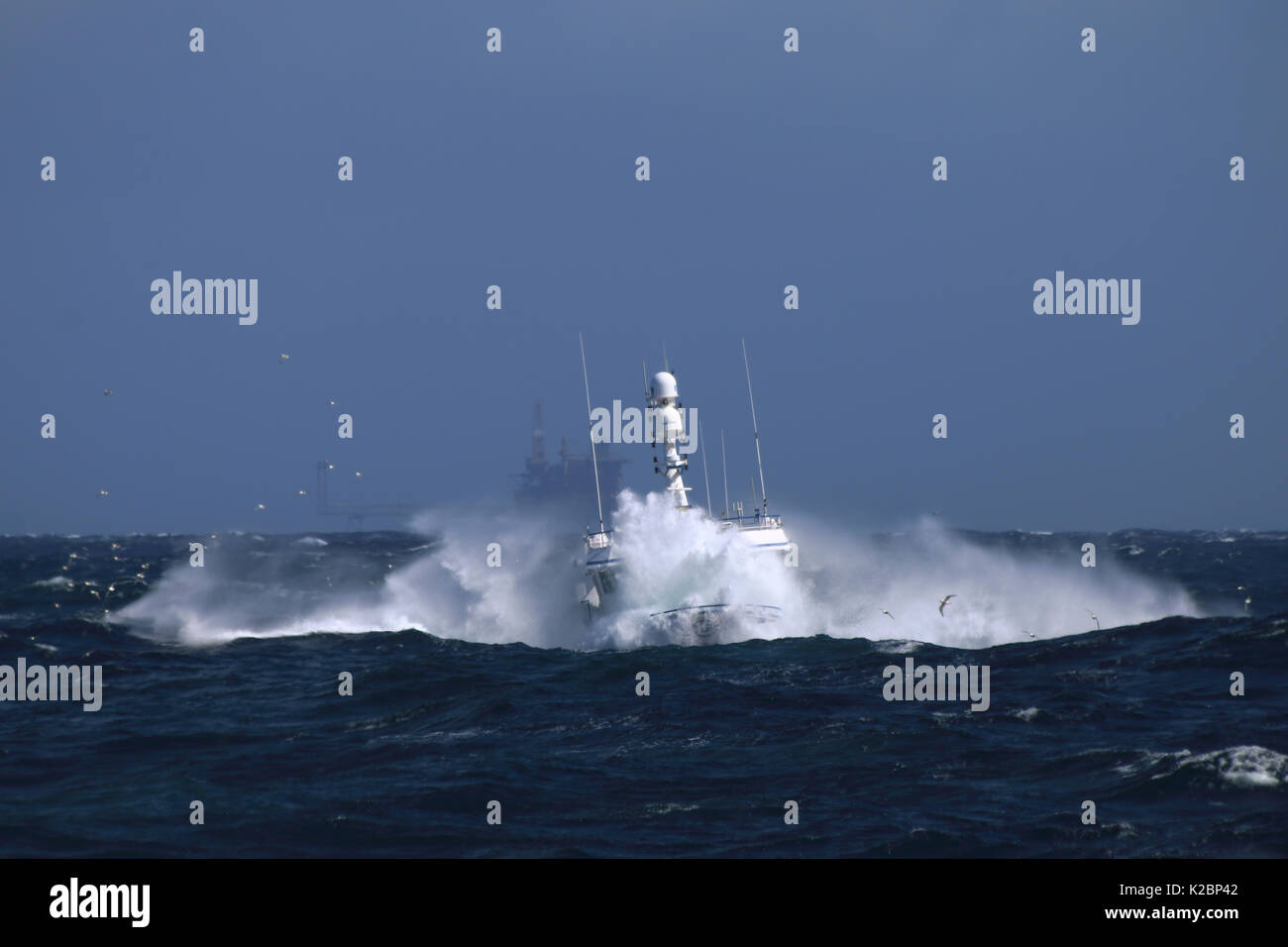 Fishing vessel 'Harvester' in rough seas, May 2015.  Property released. Stock Photo