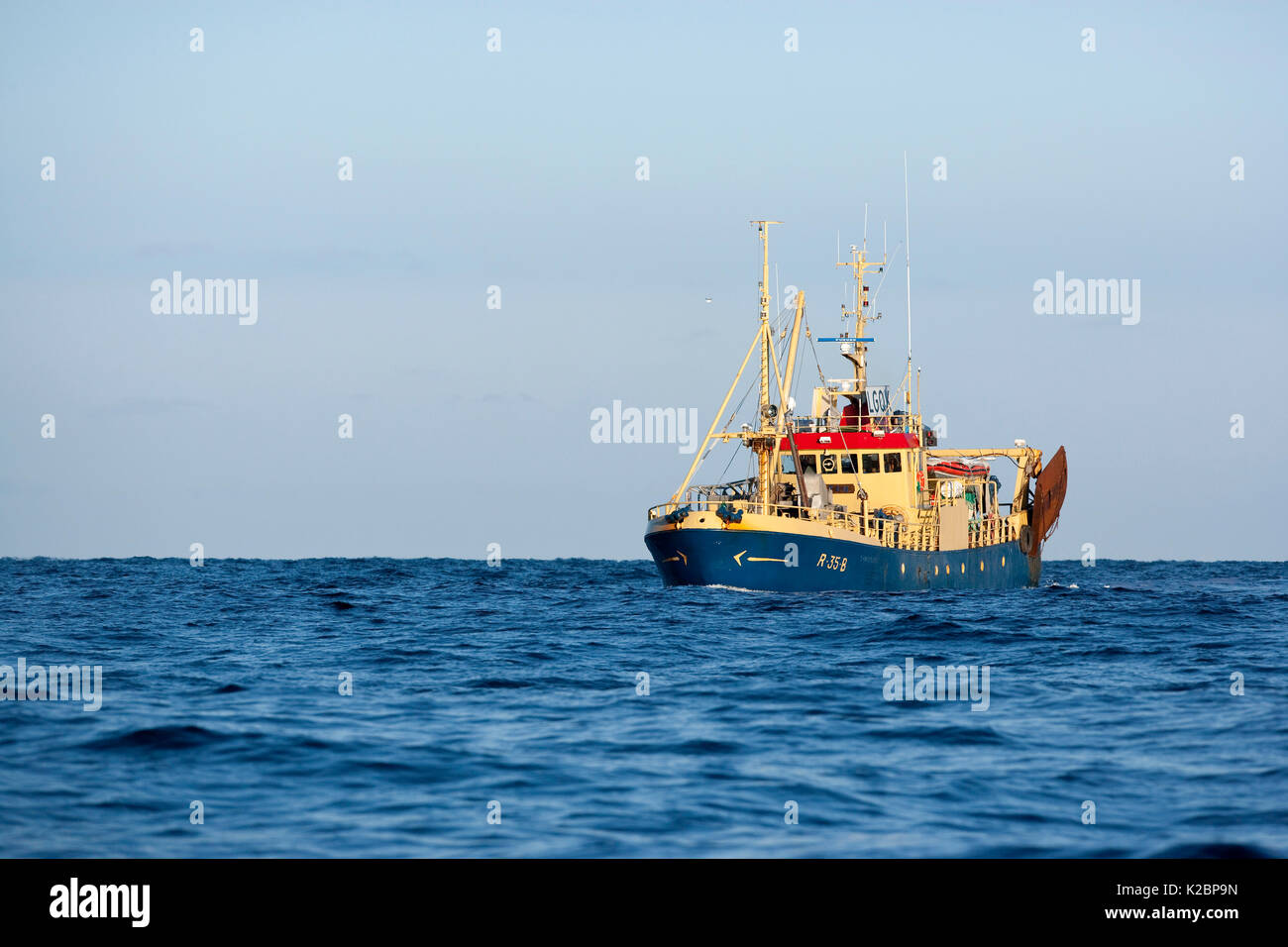 Fishing boat looking for herring, Norway, Atlantic Ocean. February 2010. Stock Photo