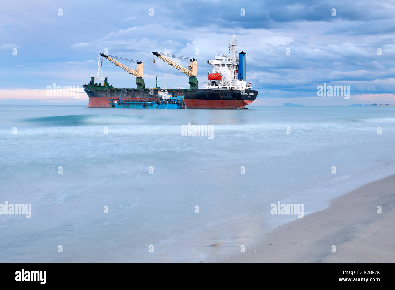 Container ship stranded on El Saler Beach, Valencia, Spain. All non-editorial uses must be cleared individually. Stock Photo