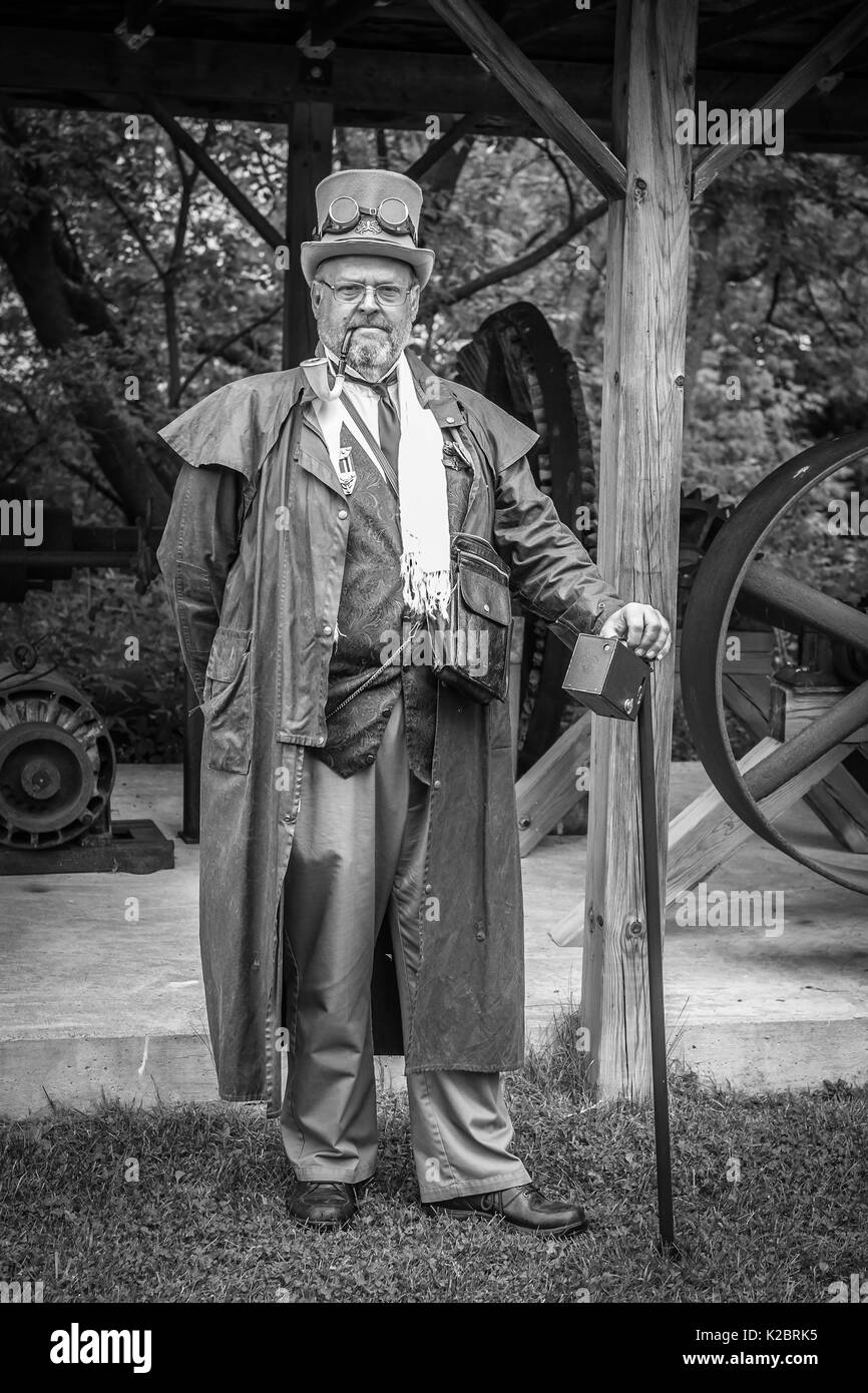 Male poses in costume at the annual Coldwater Ontario Canada Steampunk Festival. Stock Photo