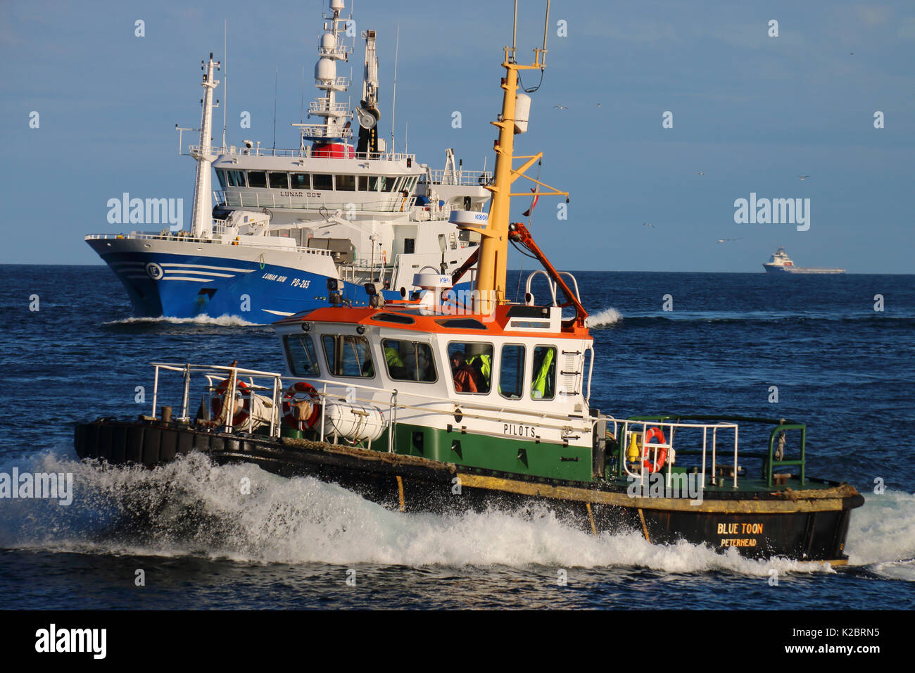 Peterhead pilot vessel and  Pelagic fishing vessel 'Lunar Bow', October 2014.  All non-editorial uses must be cleared individually. Stock Photo