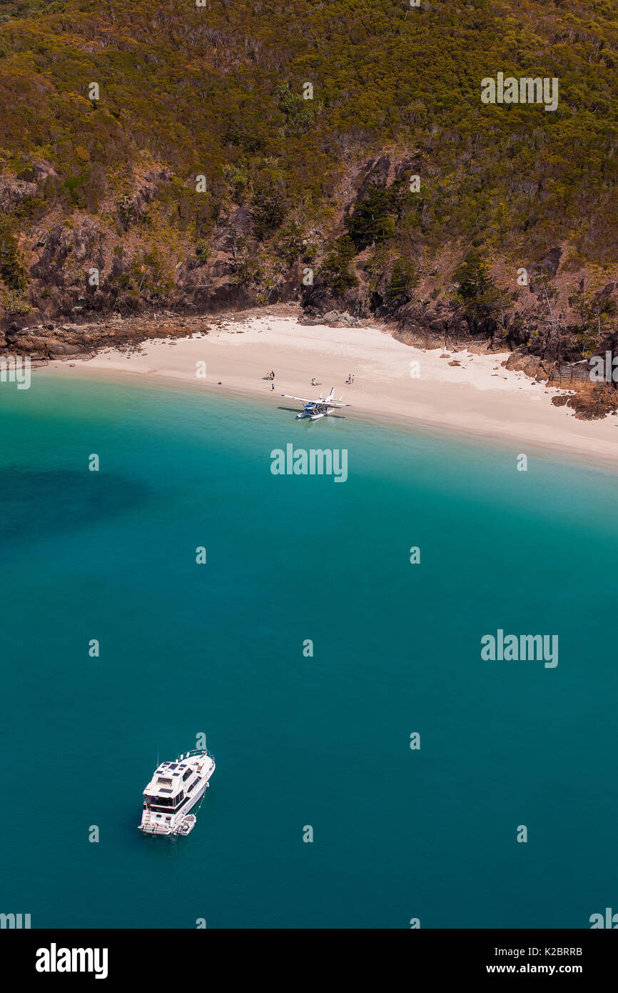 Motorboat and seaplane on coast of Hamilton Island, Whitsundays, Queensland, Australia. November