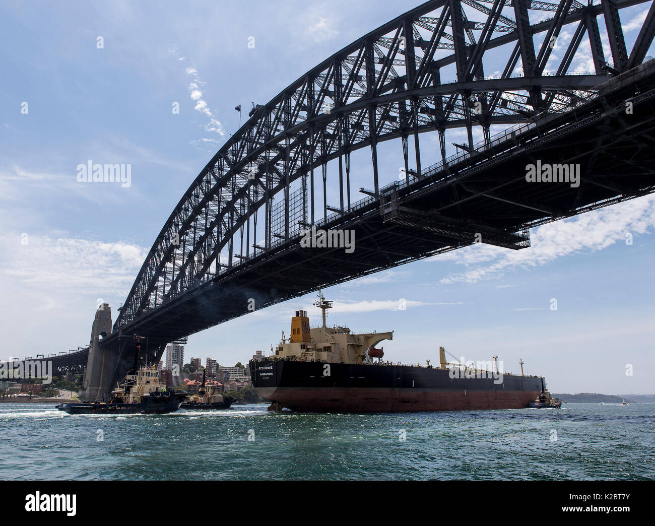 Tanker passing under the Sydney Harbour Bridge, New South Wales, Australia, October 2012. Stock Photo
