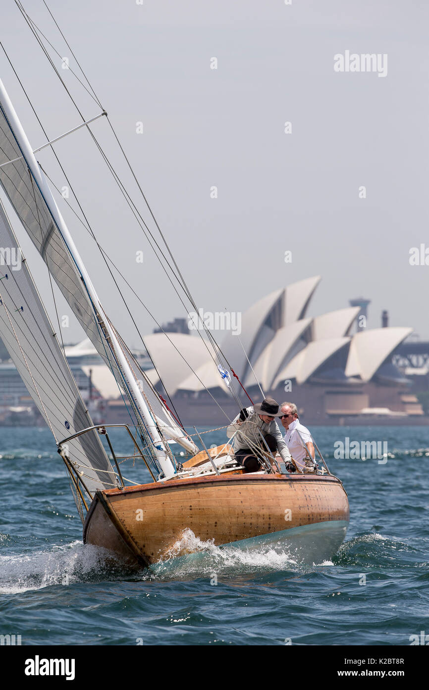 Yacht sailing in front of the Sydney Opera House, Sydney Harbour, New South Wales, Australia, October 2012. All non-editorial uses must be cleared individually. Stock Photo