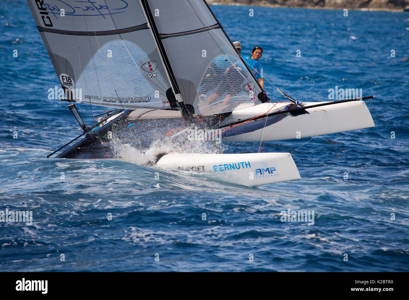 Catamaran heeling during sailors in St. Barths, West Indies, March 2012. Stock Photo
