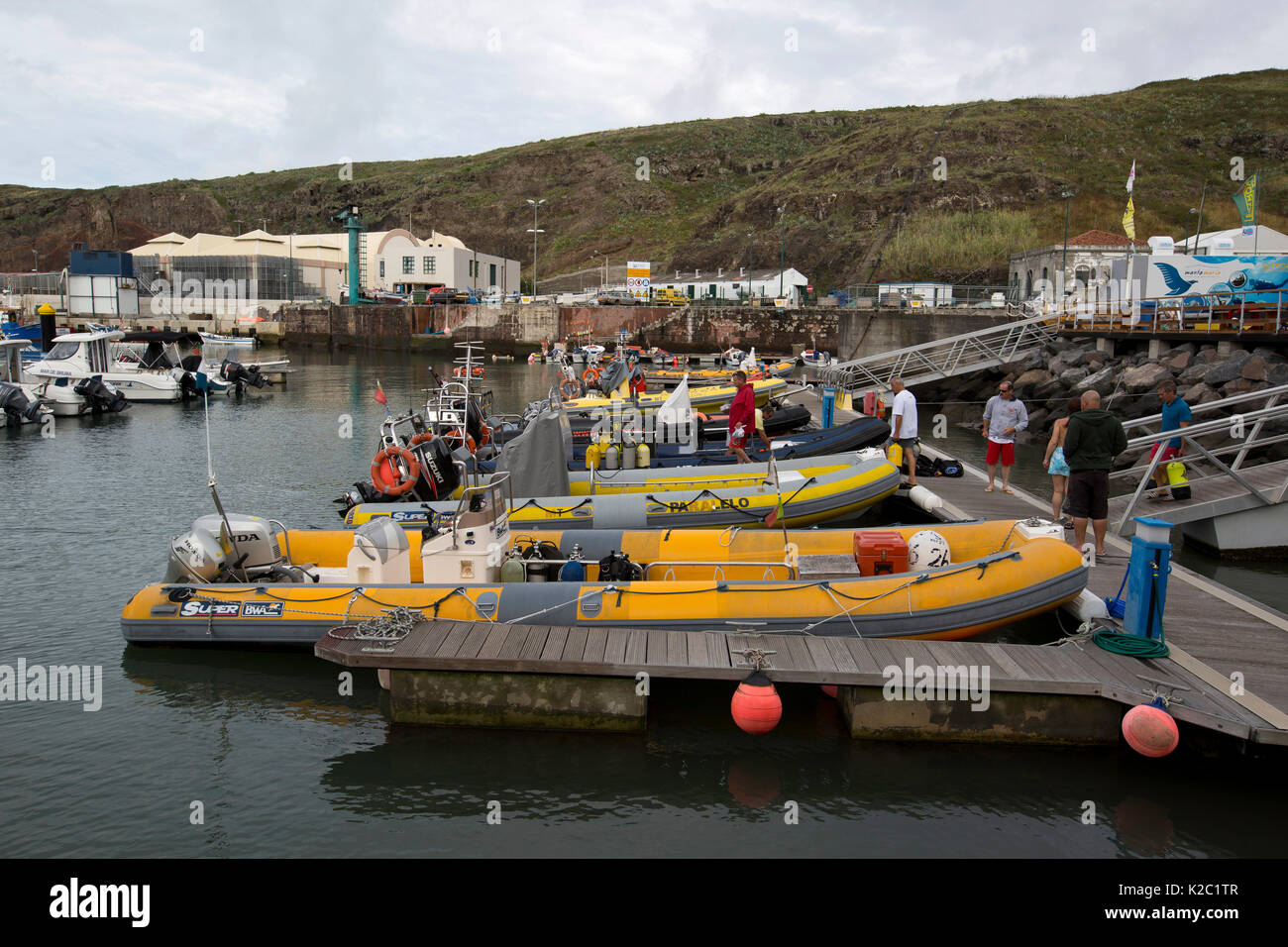 RIBs docked at Vila do Porto harbour, Santa Maria Island, Azores, Portugal, Atlantic Ocean, August 2014. Stock Photo