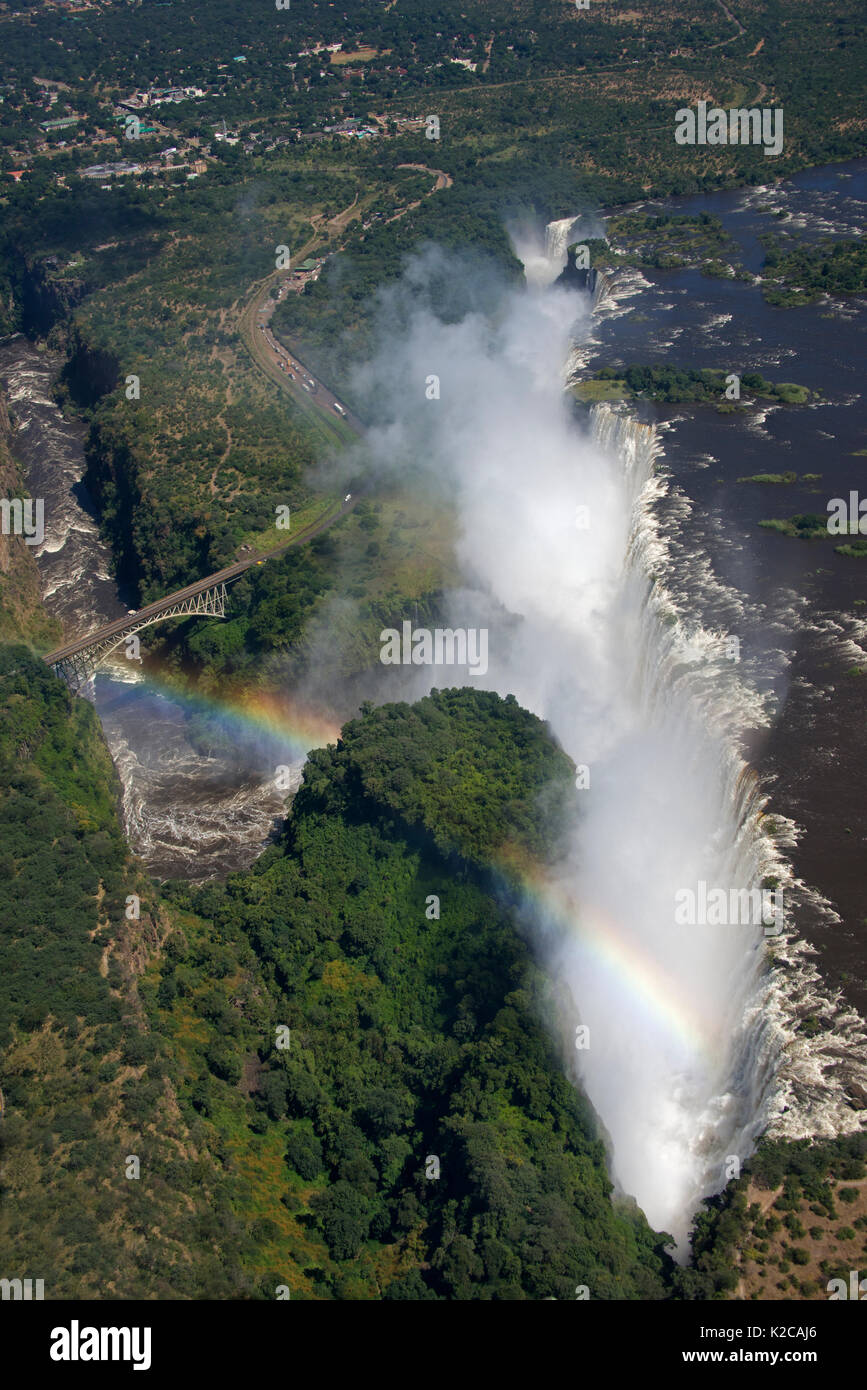 Panoramic aerial view Victoria Falls in full force and Victoria Falls Bridge Zambia/Zimbabwe Stock Photo