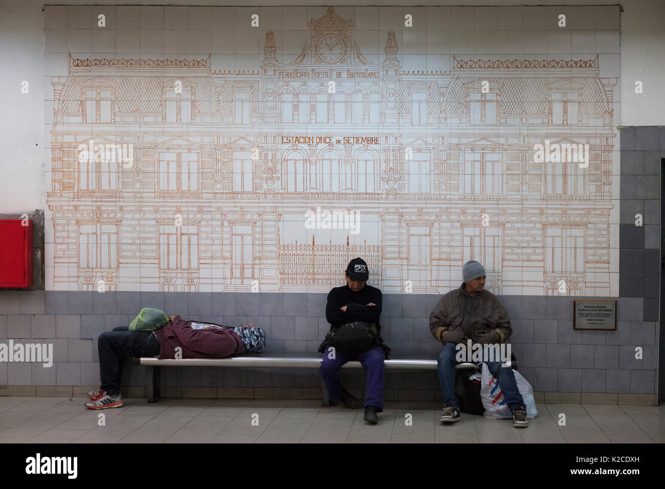 LINE H SUBWAY, BUENOS AIRES, ARGENTINA. Homeless people sleeping in the steation fo the subway. Stock Photo
