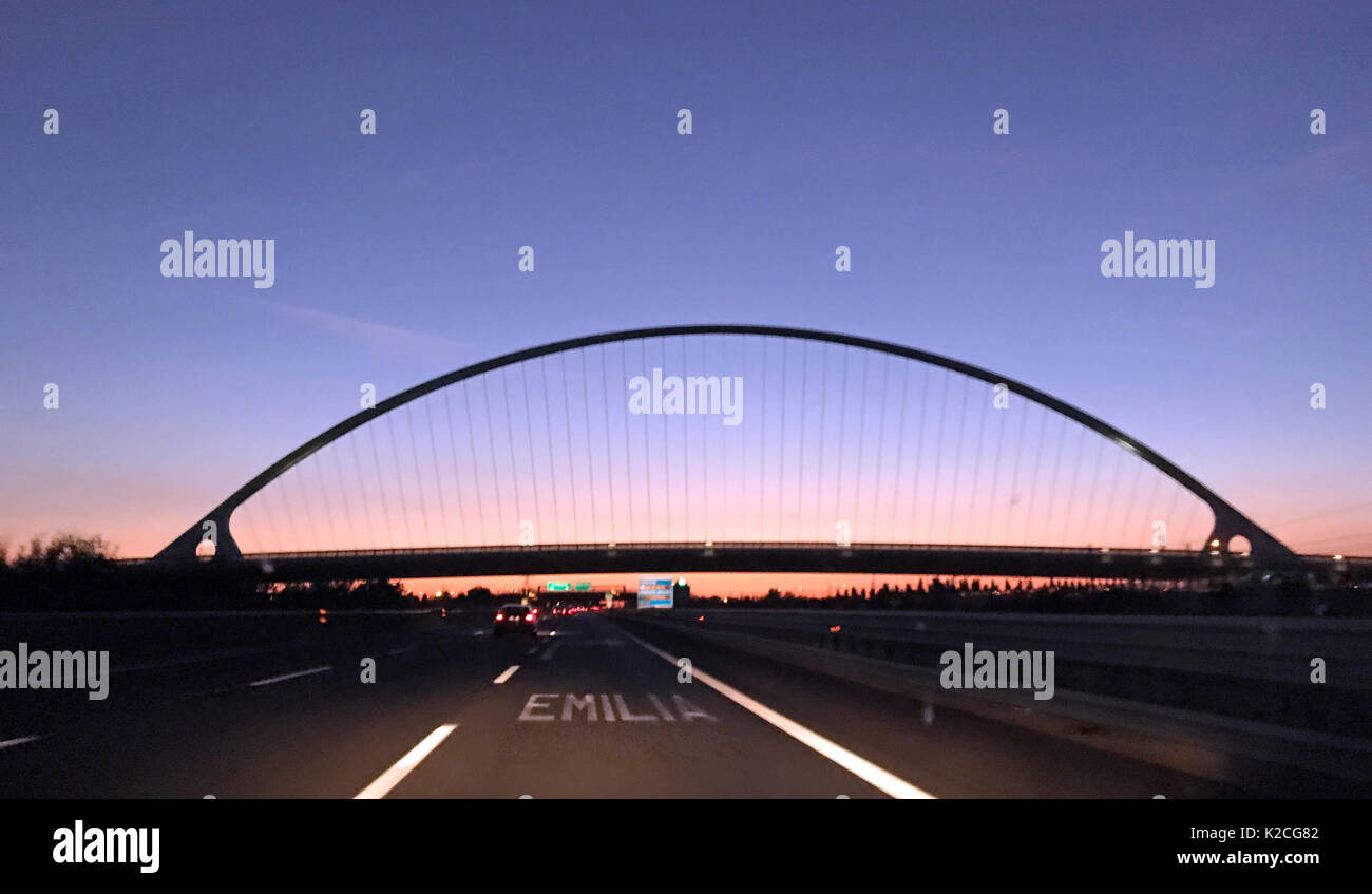 View from the car of the bridge designed by Santiago Calatrava from A1 highway, Reggio Emilia, Italy Stock Photo