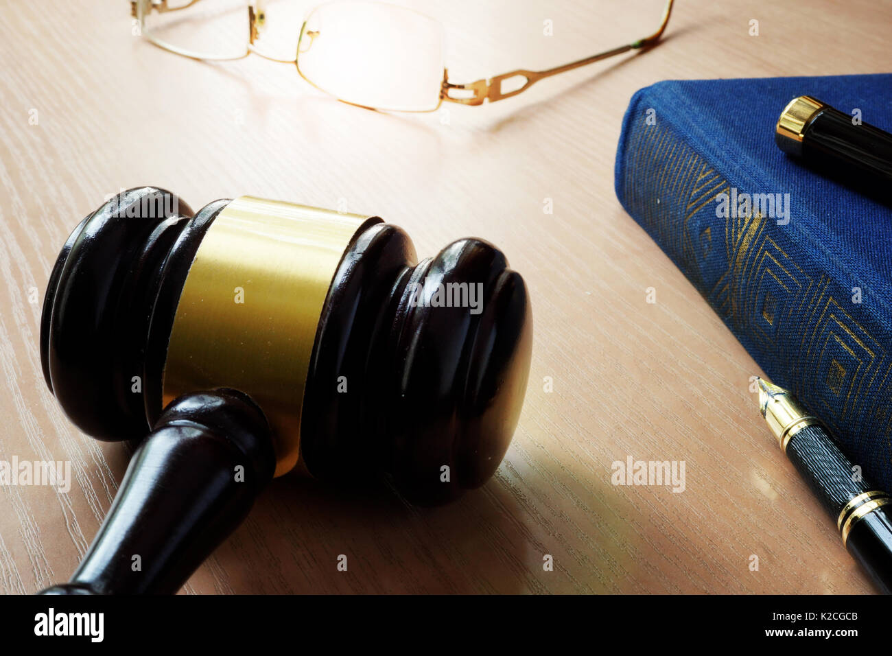 Law concept. Gavel and book on a court table. Stock Photo
