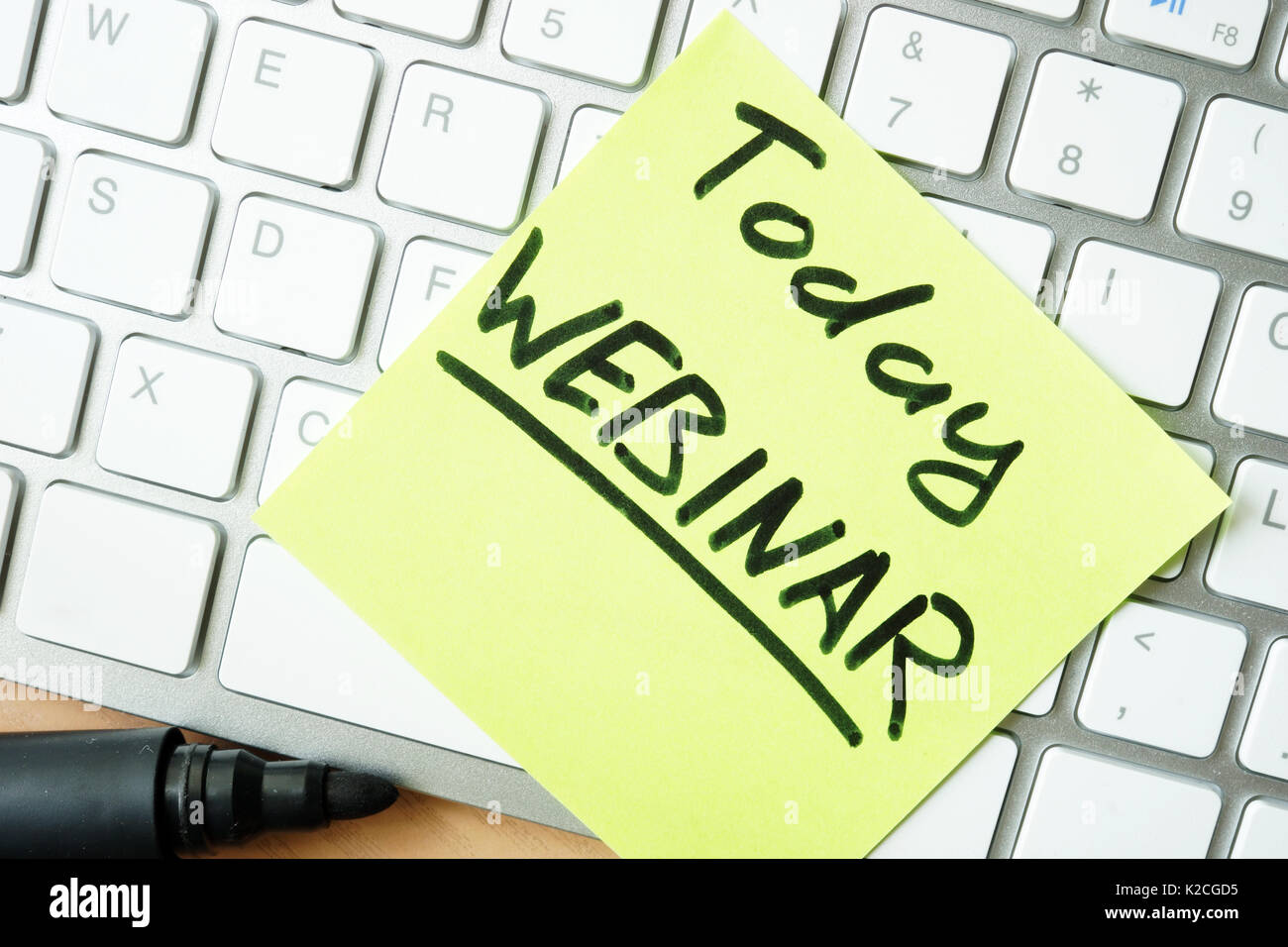 Stick of paper with sign Today webinar. Stock Photo