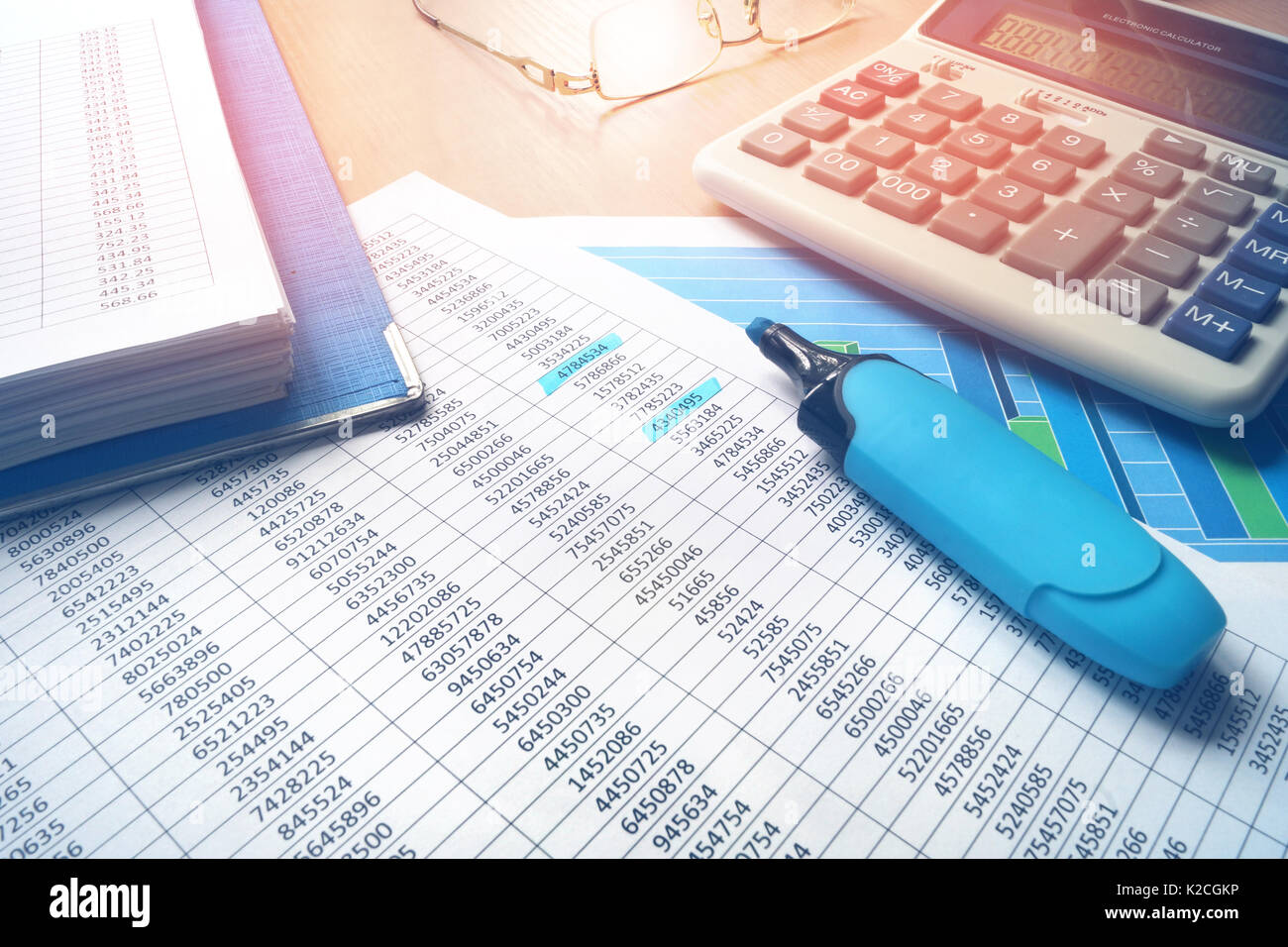 Business report for audit on an office desk. Financial analysis or