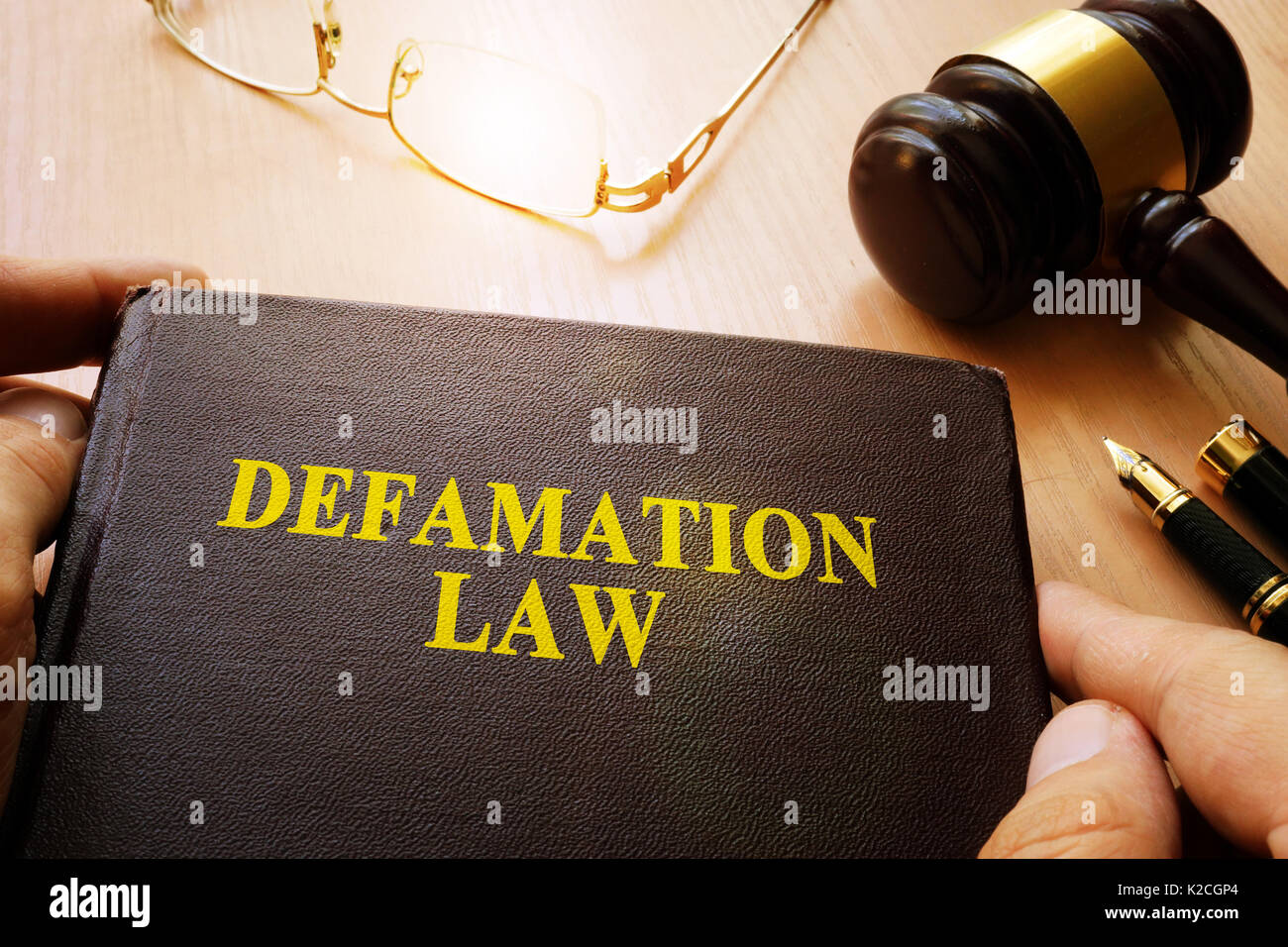 Defamation Law and gavel on a table Stock Photo - Alamy