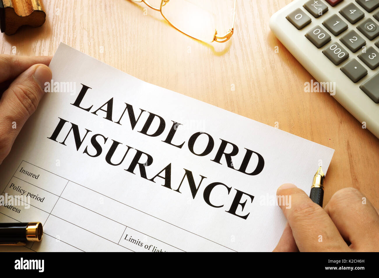 Landlord insurance on a desk. Stock Photo