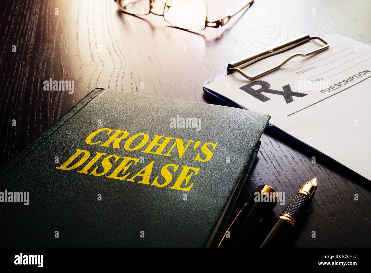 Book about Crohn's disease as type of inflammatory bowel disease (IBD). Stock Photo