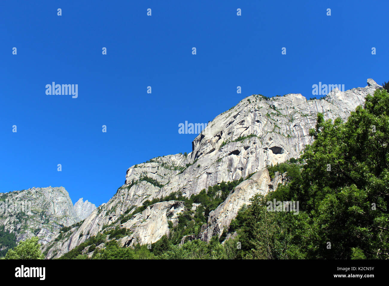 Granite rocks mountain walls in an alpine valley (Val di Mello batholith) Stock Photo