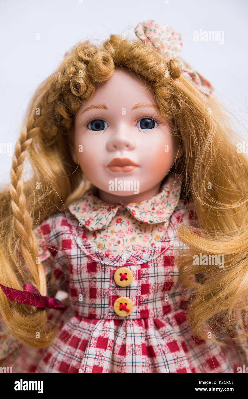old doll with red hair