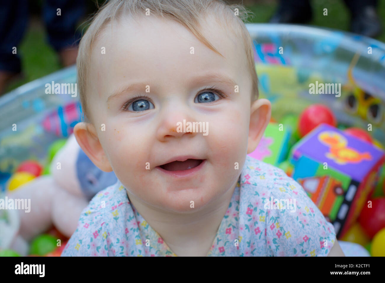 10 month old baby playing outside Stock Photo Alamy