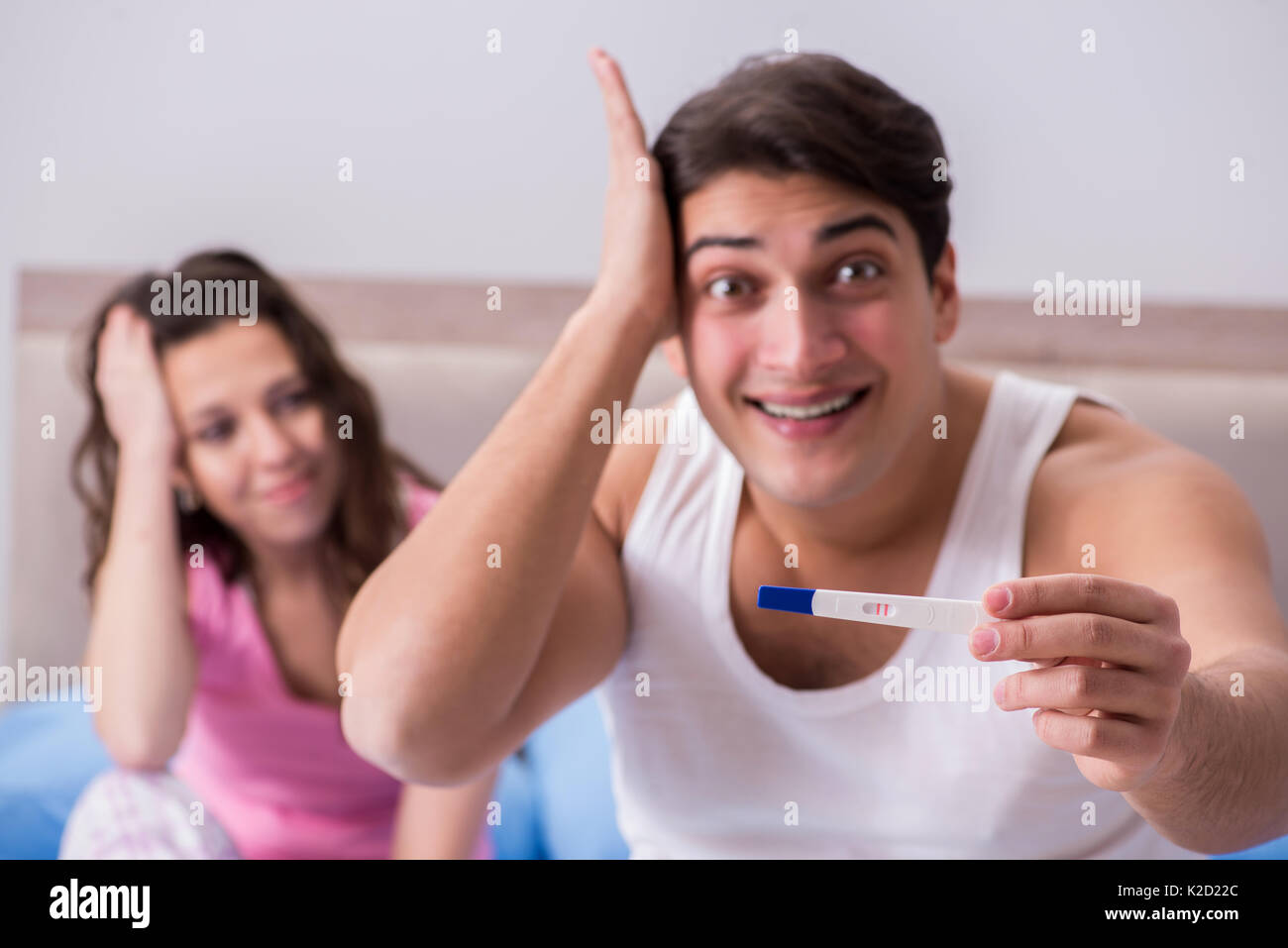 Young Family With Pregnancy Test Results Stock Photo Alamy