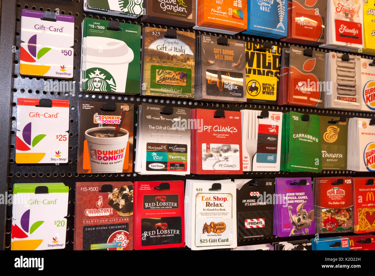 Food, drink, restaurant, & supermarket gift cards on display for sale. Stock Photo