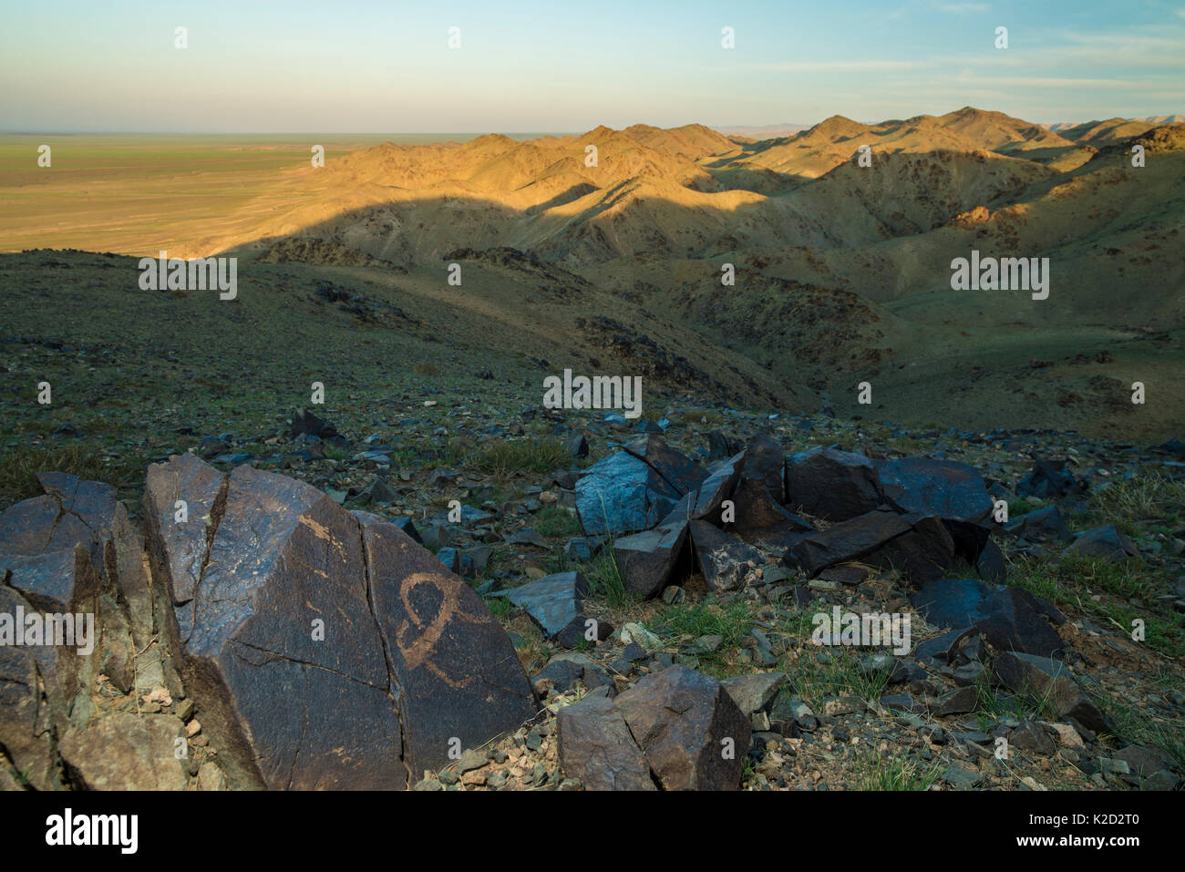 Animal petroglyphs between 5,000-15,000 years old years ago,  Khavtsgait Petroglyph Mountain, Gobi desert, Govi Gurvan Saikhan National Park, South Mongolia. June 2015. Stock Photo