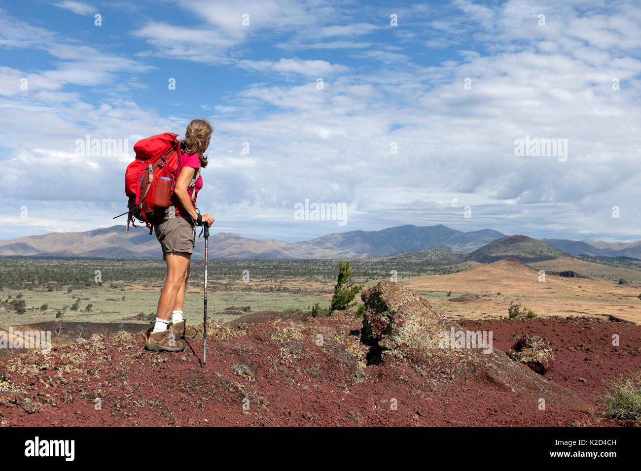Vicky Spring hiking the wilderness trail in Craters Of The Moon National Monument, Idaho, USA, July 2015. Model released. Stock Photo