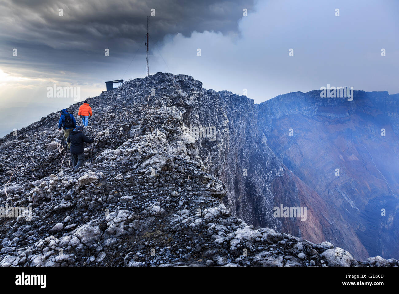Summit of the Nyiragongo Volcano, scientific monitoring equipment to monitor the gases released from the volcano, and also radio equipment for communication. Near the crater. North Kivu Province, Democratic Republic of Congo. September 2015. Stock Photo