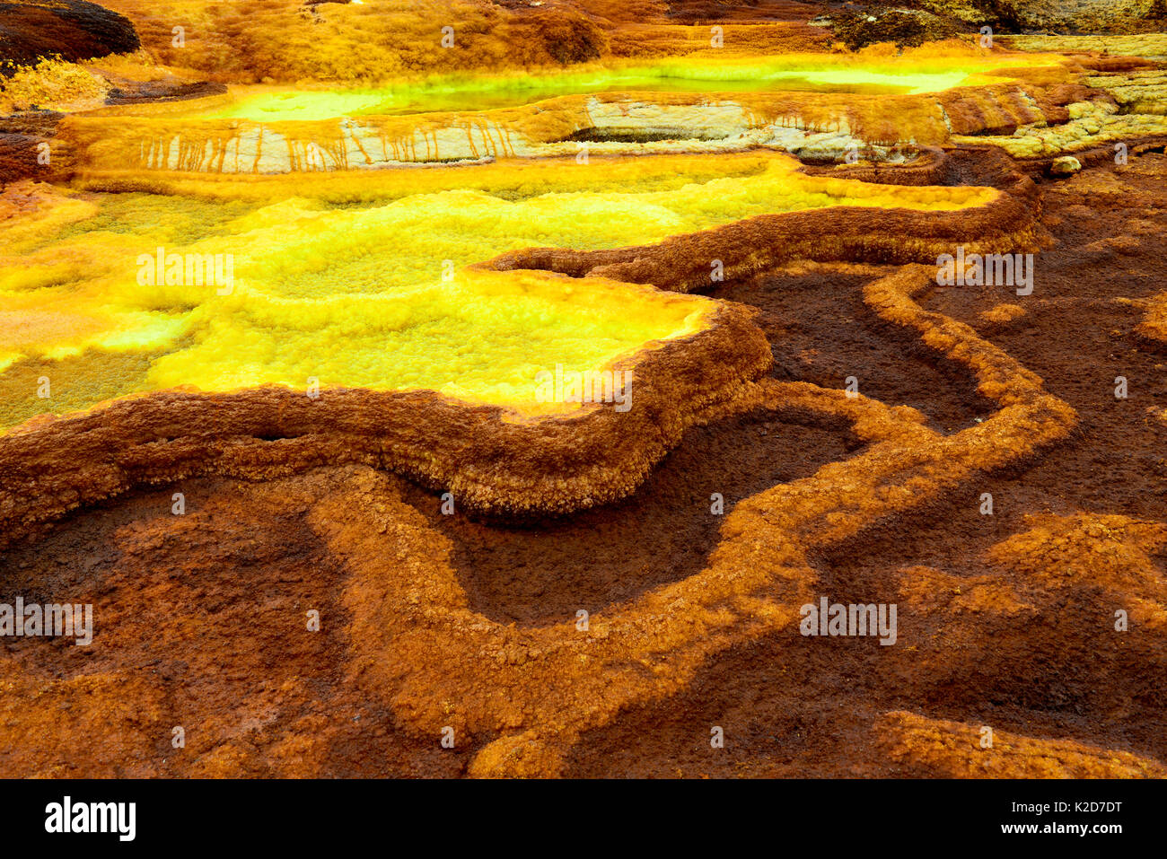Lakes and sulfur fumaroles with potassium salt mineral deposits, Dallol hydrothermal area of Lake Assale. Danakil Depression, Afar Region, Ethiopia, Africa. November 2014. Stock Photo