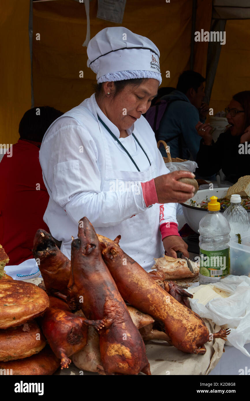 Cuy (roasted Guinea Pig) at food stall, San Francisco Plaza, Cusco, Peru, South America Stock Photo