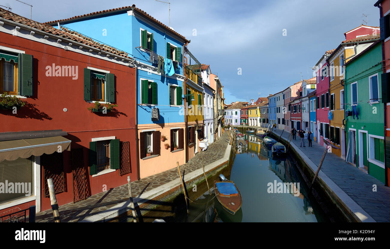 View down a canal in Burano, one of the islands in the lagoon, Venice, Italy 2016 Stock Photo