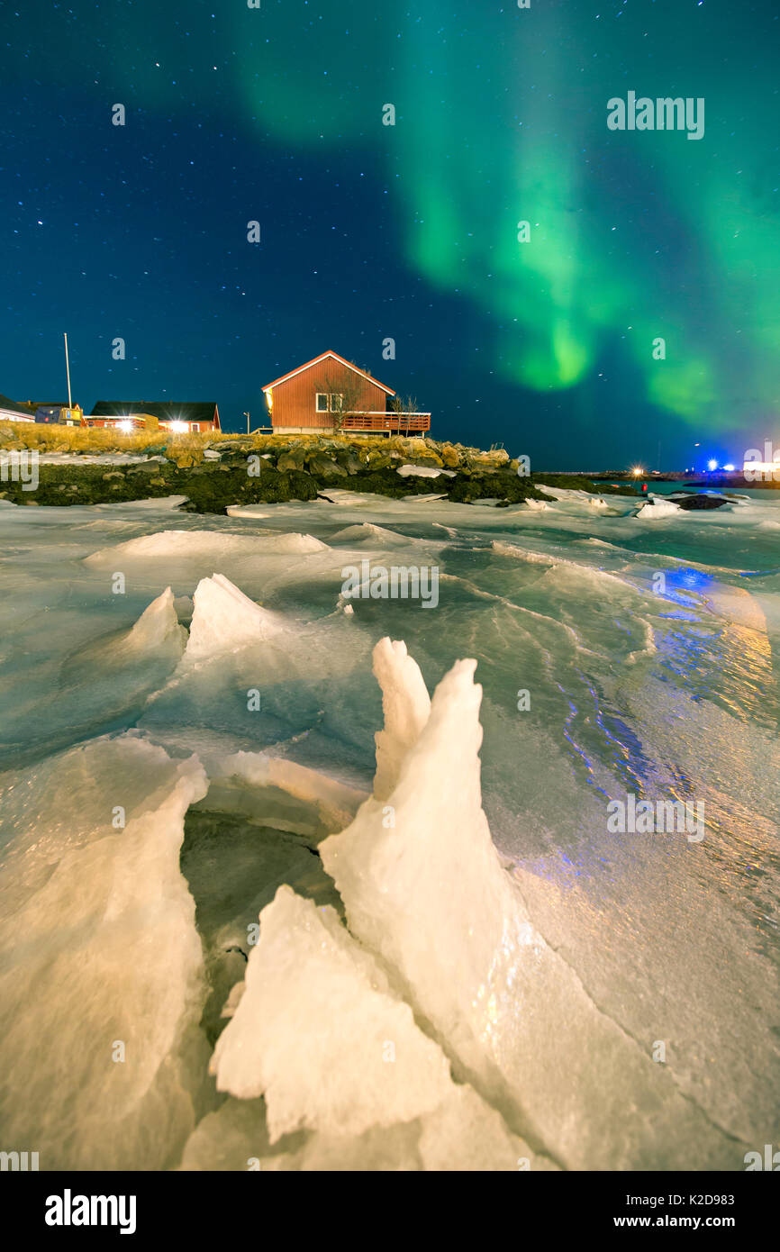 Northern lights over Andenes village,  Andenes, Andoya island, North Atlantic Ocean, Norway, January 2016 Stock Photo